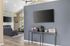 Canyon Springs clubhouse fireside lounge with wall-mounted TV and cozy coffee station for residents in Lynnwood WA