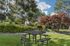 Canyon Springs wading pool and outdoor relaxation area surrounded by mature trees in Lynnwood Washington