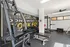 303 Flats fully equipped gym with Peloton bikes and strength training machines in Knoxville Tennessee