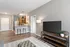 303 Flats student apartment living area with modern decor and comfortable community-style layout in Knoxville TN
