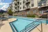 Outdoor saltwater swimming pool surrounded by sundeck at The Landings apartment community Knoxville TN