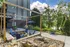 Outdoor lounge area with firepit and comfortable seating under pergola at The Landings Knoxville TN