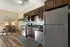 Spacious model kitchen with modern appliances and stylish finishes at The Landings apartments Knoxville TN
