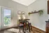 Open-concept model dining area with contemporary furnishings at The Landings riverside living Knoxville TN