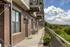 Multi-story apartment exterior with private balconies at The Landings riverside community Knoxville TN