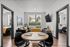 Chic apartment interior showcasing a cozy living area with modern furniture, dining table set for two, and two bright, welcoming bedrooms.