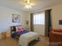 La Aloma Apartments, interior, child's bedroom, window, bed, carpet, desk and chair, ceiling fan,