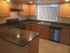 Marcell Gardens Apartments, interior, kitchen, peninsula counter, stainless steel appliances,
