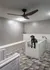 Rendering of a pet washing room with two large tubs, detachable sprayers, dryers with hoses and a hand-washing sink.