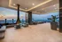 24th floor outdoor lounge with floating fireplace, lounge seating, grilling stations and firepits