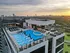Rooftop infinity edge pool with 360° infinity edge conversation pit