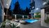 Resort-style pool courtyard with ample seating