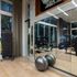 24-hour fitness center featuring Echelon Smart Connect Bikes and Reflect Touch Mirror
