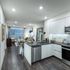 Chef-inspired kitchens with premium appliance packages, spacious islands, and built-in pantries