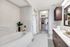 Spa-inspired baths with dual vanity sinks, separate showers and soaking tubs