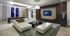 Lounge with a pool table, white leather sectional seating, HDTV, wood-paneled walls, and modern sculptures