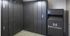 Full-length and half-length lockers with a dark wood-style finish and a logo reading "MW Cleaners."