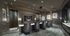 A private theater with three rows of tiered upholstered seating.