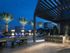 City skyline view from the poolside outdoor grilling and dining area
