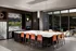 Resident pantry with a breakfast bar, banquet seating, stainless steel appliances, a flat-screen TV, and floor-to-ceiling windows with city views.