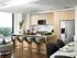Open-concept kitchen with stainless-steel appliances, modern light wood cabinetry, an island with four bar stools, dark wood-style floors and a city view through the large window.