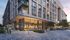 3D rendering of Hanover Parkview from the sidewalk, with a view into the retail businesses and restaurants on the first floor.
