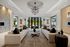 Image of resident lobby with cozy fireplace and ample seating ideal for remote working
