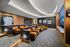 screening lounge with HD projector and cinema-style seating