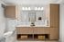 bathroom with toilet and double vanity with storage cabinets
