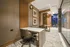 room with two built-in desks with task chairs