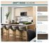 kitchen photo with white quartz countertops, beige wood cabinets, brown wood flooring, and Bianco mist title backsplash