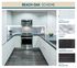 kitchen photo with black granite countertops, white wood cabinets, marble title backsplash and dark wood flooring