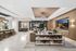 resident club room lounge featuring a variety of lounge and dining seating areas
