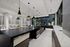 club room with catering kitchen including oven, warming drawers and spacious counter-height counters