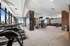 Gym with several cardio equipment, multiuse work out machine and free weights