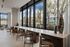 elounge with floor to ceiling windows and counter seating with power outlets at all 5 chairs