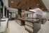 entertaining space with kitchen island with oven and two warming drawers