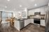 Modern open-plan apartment with stylish kitchen, inviting living area, and elegant decor, perfect for contemporary living.