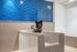 Chic pet washing station with vibrant blue chevron tiles, perfect for pampering your furry friend in style.