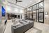 Luxurious open-concept living space featuring plush seating, sleek modern design, and ample natural light for ultimate relaxation and entertainment.