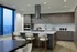 Elegant modern kitchen with sleek cabinetry, marble countertops, and panoramic city views, perfect for entertaining.