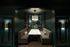 Sophisticated modern dining nook with ambient lighting, featuring elegant seating and a contemporary table, ideal for intimate gatherings.