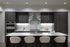 Modern kitchen with sleek dark wood cabinets, marble countertops, and stainless steel appliances, offers a stylish and functional space for cooking and entertaining.
