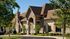 Gather, socialize, and relax in our tastefully decorated community clubhouse with comfortable seating areas. | International Village Lombard | Apartments in Lombard