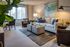 This thoughtfully designed living room maximizes comfort and functionality with smart layout choices. | International Village Lombard |