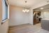 Renovated 2 Bedroom Tower Prospective Kitchen & Dining Area with plank-style flooring at The Views of Naperville apartments