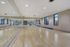 Find balance and strength in our tranquil yoga studio featuring natural light and all the equipment needed for your practice. | International Village Lombard | International Village Lombard Apartments