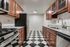 Your spacious kitchen offers generous square footage with room for multiple people and all your cooking essentials. | International Village Lombard | Apartments in Lombard