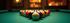 Show off your skills at our pool table in the game room where residents gather for friendly competition and casual entertainment. | International Village Lombard |