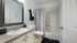 Bathroom with one sink, shower, and toilet